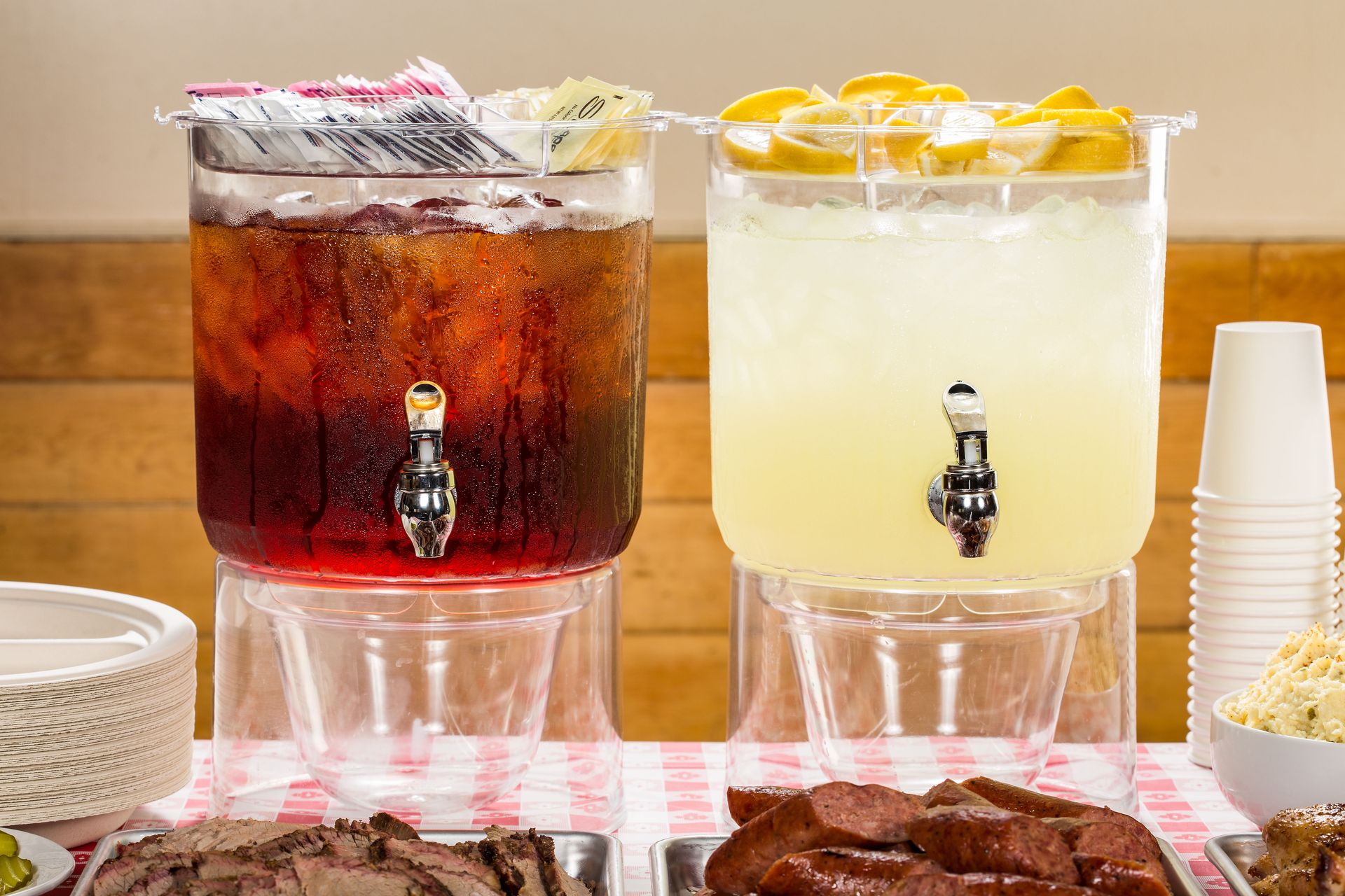 Iced tea and lemonade dispensers at a BBQ buffet in Austin, Texas.